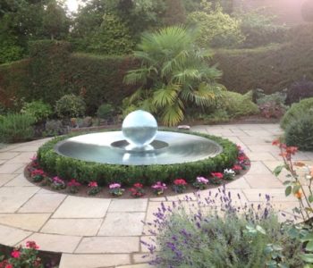 Aqualens Sphere Fountain in Harrow, London Garden