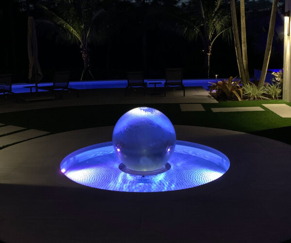 lighted-garden-fountain-at-night