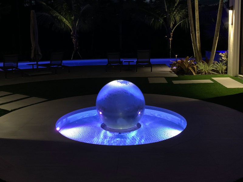 Lighted Sphere Fountain at Night