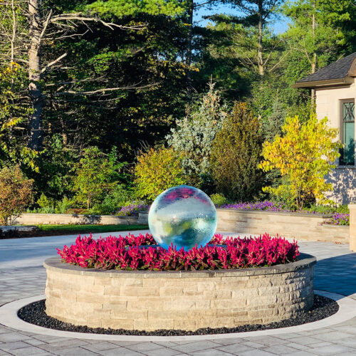 sphere-fountain-in-center-driveway-garden