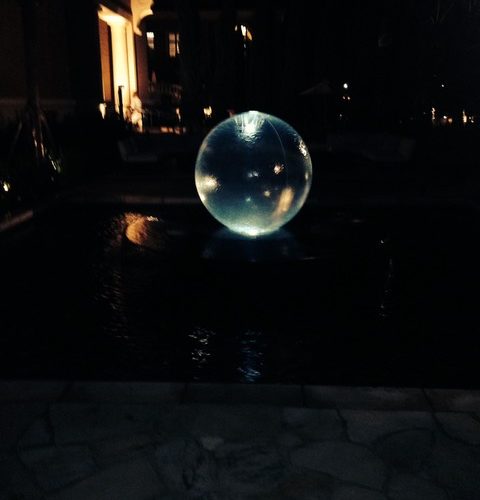 Glowing Sphere Fountain at Night