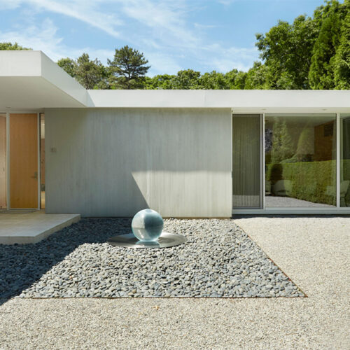 Sphere in courtyard.