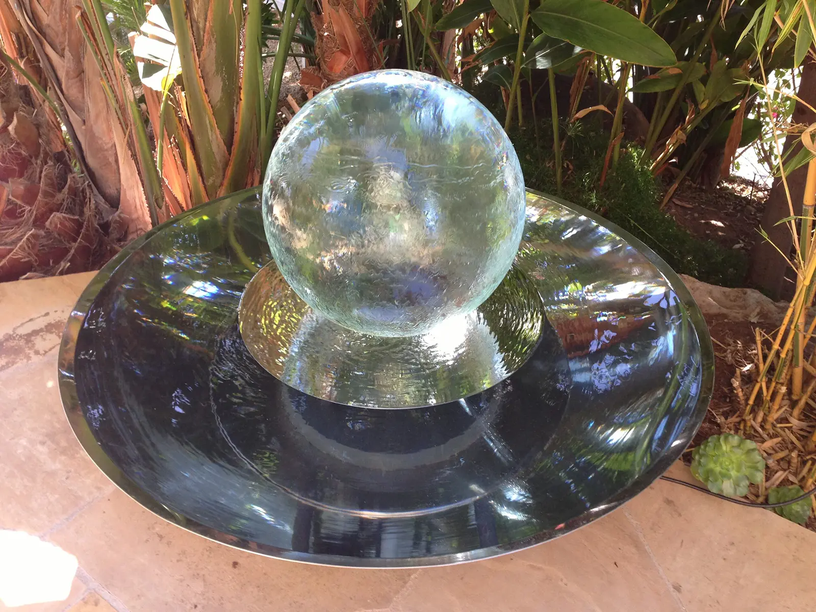 Sphere fountain with crystal orb and stainless steel dish